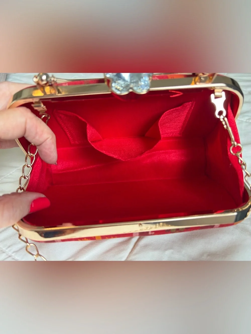 Red Patterned Evening Clutch with Gold Hardware and shoulder chain strap include